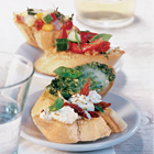 Geroosterd stokbrood met gedroogde tomaten en ricotta