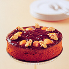 Snelle chocoladetaart met kumquat en walnoten