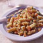 Pastasalade met zalm of rauwe ham
