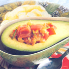 Gevulde avocado met tomaat en kerrievinaigrette
