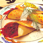 Blini's met bietensalade en dilleroom