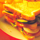 Clubsandwich met bacon en tomaat