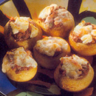 Gevulde champignons met ham en olijven