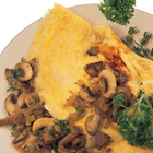 Omelet met gebakken paddenstoelen