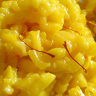 Saffraanrisotto met ham en doperwten
