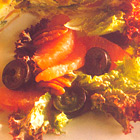 Salade van lollo rosso, pecannoten en druiven