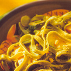 Tagliatelle met gerookte kip en courgette