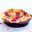 Clafoutis met frambozen en pistachenootjes