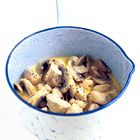Kip met champignons in crème fraîche