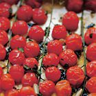 Tomaten uit de oven met knoflook, tijm en basilicum