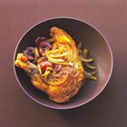 Tajine van parelhoen met pruimen