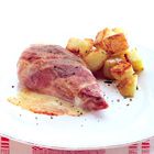 Kip uit de oven met taleggio en prosciutto