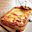 Aardappelgratin met maïs en pompoen