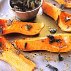 Geroosterde pompoen met pompoenpitpesto