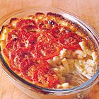 Macaroni met kaassaus en tomaten
