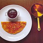 Flensjes met rum, marmelade en chocolade