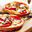 Bladerdeeg pizza met geitenkaas en tomaat