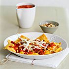 Ravioli met geitenkaas en paprikasaus
