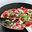 Pan pizza met gekaramelliseerde uien en dolcelatte