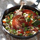 Cassoulet met confit de canard en Parmaham