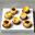 Speculaas-tarteletjes met mini cheesecake en frambozenjam