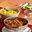 Indiase curry met rijst en komkommer raïta