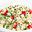Couscous salade met kerstomaatjes en lente-ui
