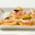 Mosselen met paprikaspread op crostini