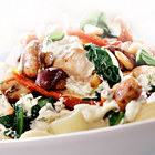 Penne met kip, spinazie en champignons