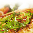 Pizza met ham en mozzarella
