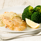 Tilapia met broccoli en paprikasaus