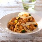 Tomatenrisotto met kastanjechampignons en courgette