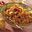 Macaroni met gehakt, prei en kruidenkaas