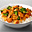 Rijst met kip tandoori, broccoli en champignons