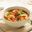 Pittige oosterse vissoep met zalm, tilapia en gamba's