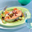 Zalm met courgette- en worteltagliatelle en tomatendressing