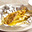 Tilapia-pakketje met wortelsalade