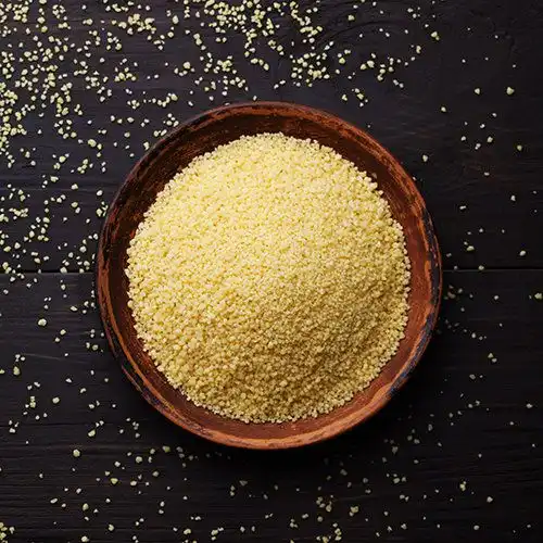 Couscous met gebrande noten en gebakken gamba's met mango