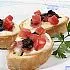 Crostini met mozzarella, rauwe ham en truffelcrème