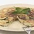 Frittata met zoete uien, courgette en munt