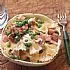 Recept Nigella Lawson: pasta met ham, erwtjes en room