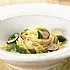 Asperges met spaghetti, truffelkrullen en Parmezaanse kaas