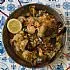 Paella met kip, mosselen en garnalen
