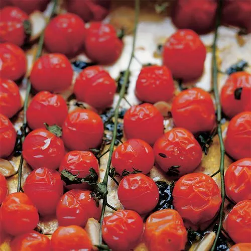 Tomaten uit de oven met knoflook, tijm en basilicum