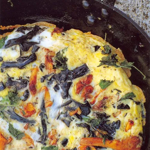 Frittata met trompettes de mort en cantharellen van The River Cafe