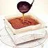 Wortelcake met walnoten, sultana's, kokos en citrussiroop