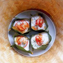 Tip: Thaise kip met curry in een mandje van bananenblad