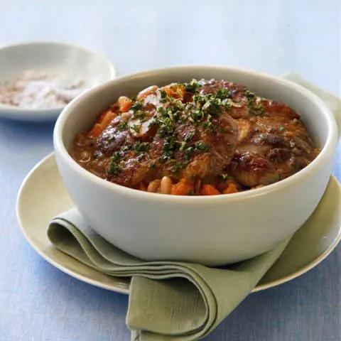 Ossobuco en cannellinibonen met knoflook