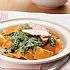 Ravioli met gerookte kip en romige spinaziesaus