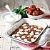 Gebakken tomaten met basilicum en gesmolten mozzarella